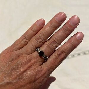 Garnet/Diamond colored stone ring. Band has silver beads all the way around.